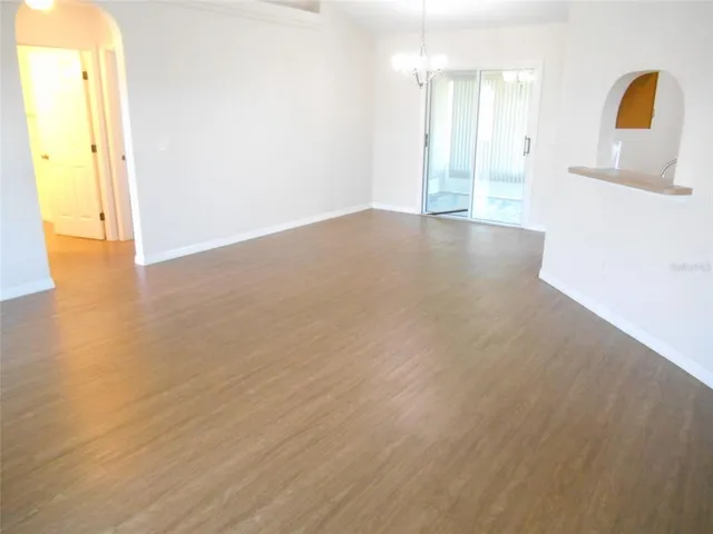 a view of a livingroom with wooden floor