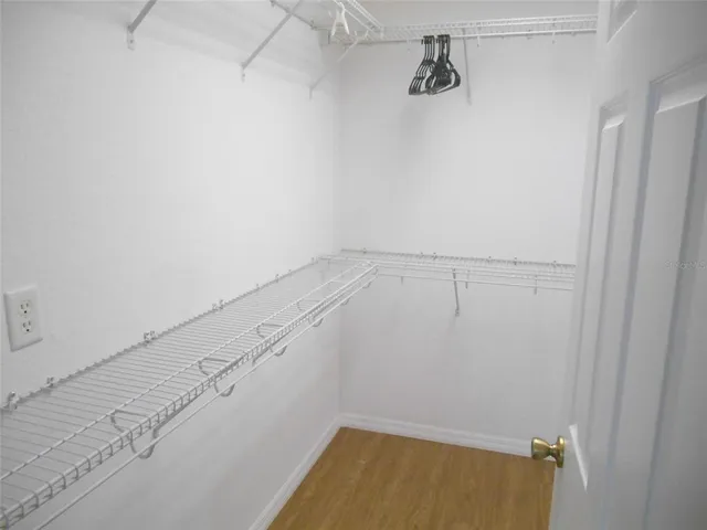 a view of a room with racks on the wall