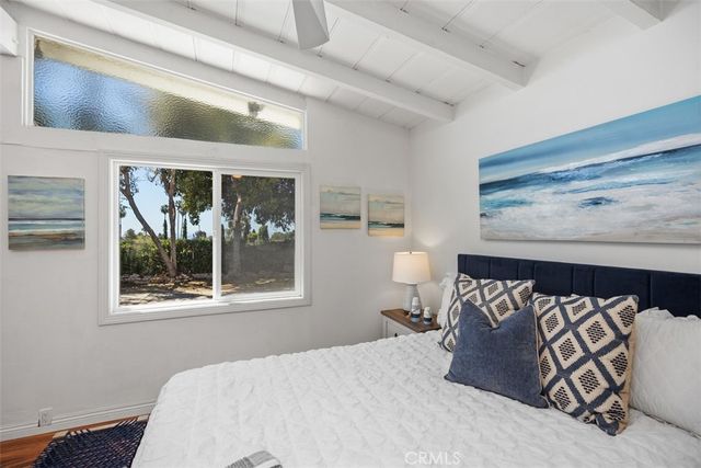 a bathroom with a sink a mirror and a shower