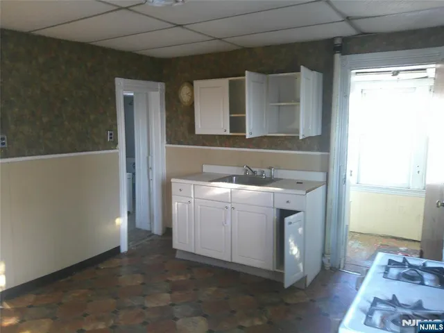 a bathroom with a toilet and a sink