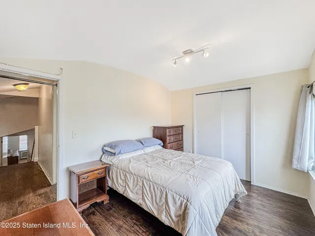 a view of a patio with a table and chairs