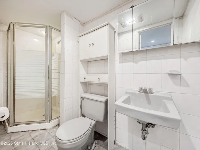 a front view of a house with glass windows