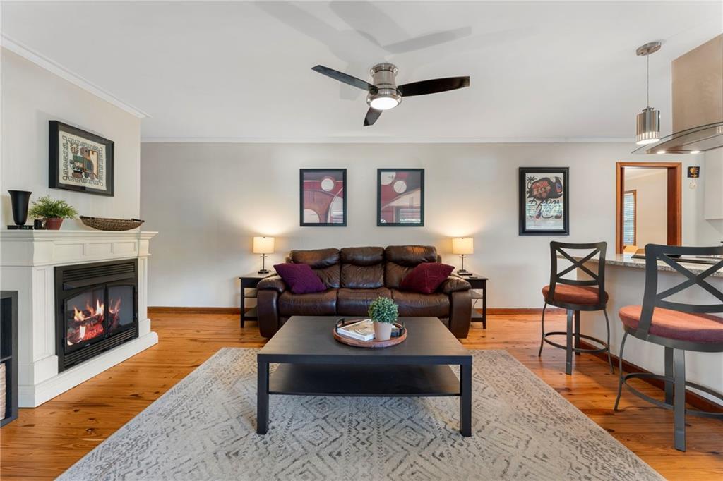5122 Lavista Road Tucker, GA 30084 - Photo 1 of 24 a living room with furniture and a fireplace