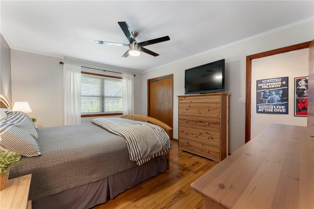 5122 Lavista Road Tucker, GA 30084 - Photo 11 of 24 a bedroom with a bed and a flat screen tv