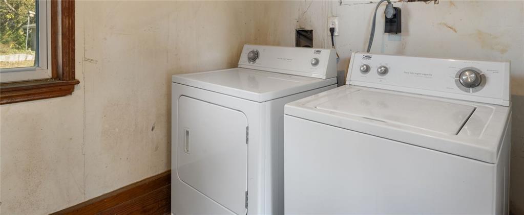 5122 Lavista Road Tucker, GA 30084 - Photo 18 of 24 a utility room with dryer and washer