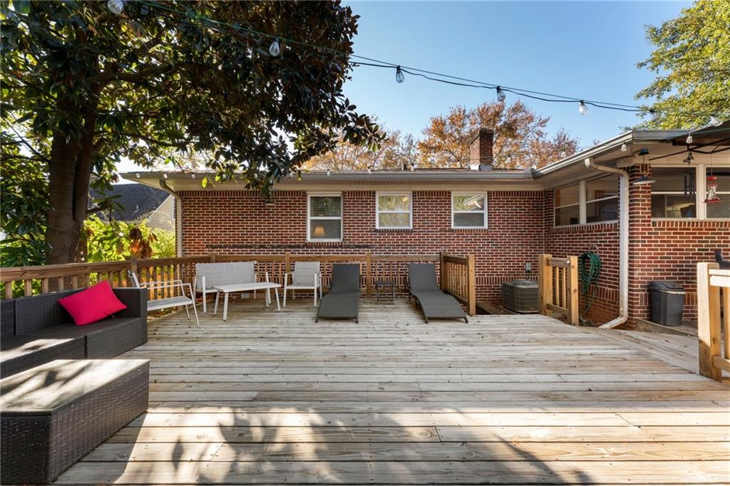 5122 Lavista Road Tucker, GA 30084 - Photo 19 of 24 a view of a chairs and table in backyard
