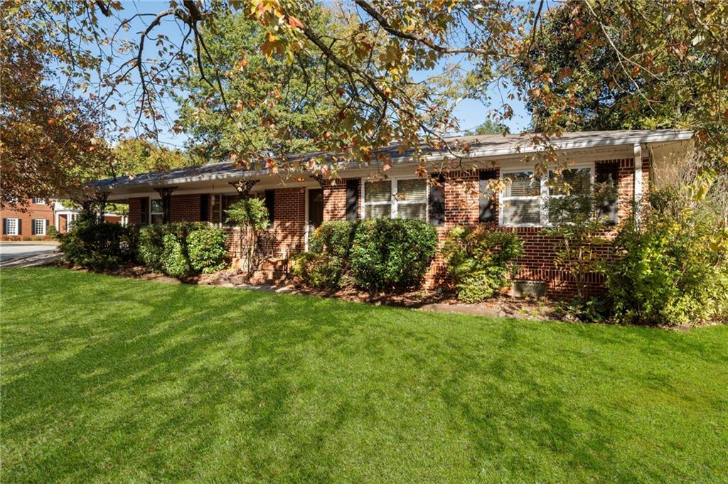 5122 Lavista Road Tucker, GA 30084 - Photo 24 of 24 a front view of house with yard and green space