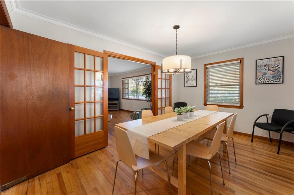 5122 Lavista Road Tucker, GA 30084 - Photo 7 of 24 a view of a dining room with furniture window and wooden floor