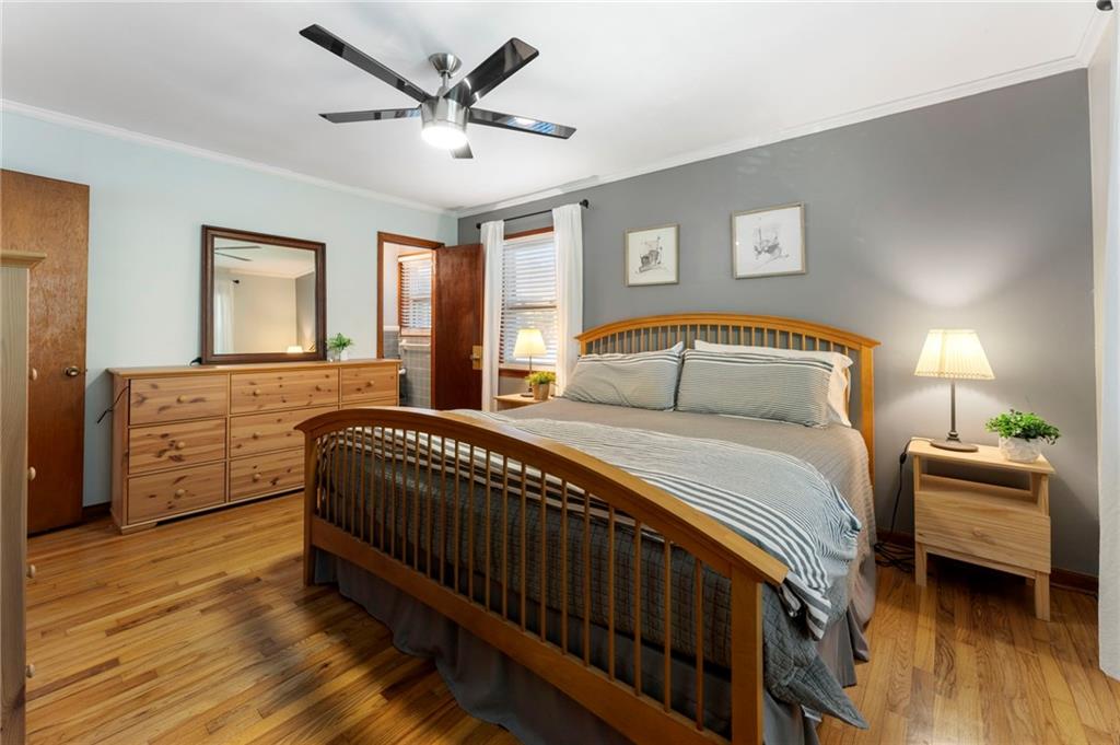 5122 Lavista Road Tucker, GA 30084 - Photo 10 of 24 a bedroom with a bed and a chandelier