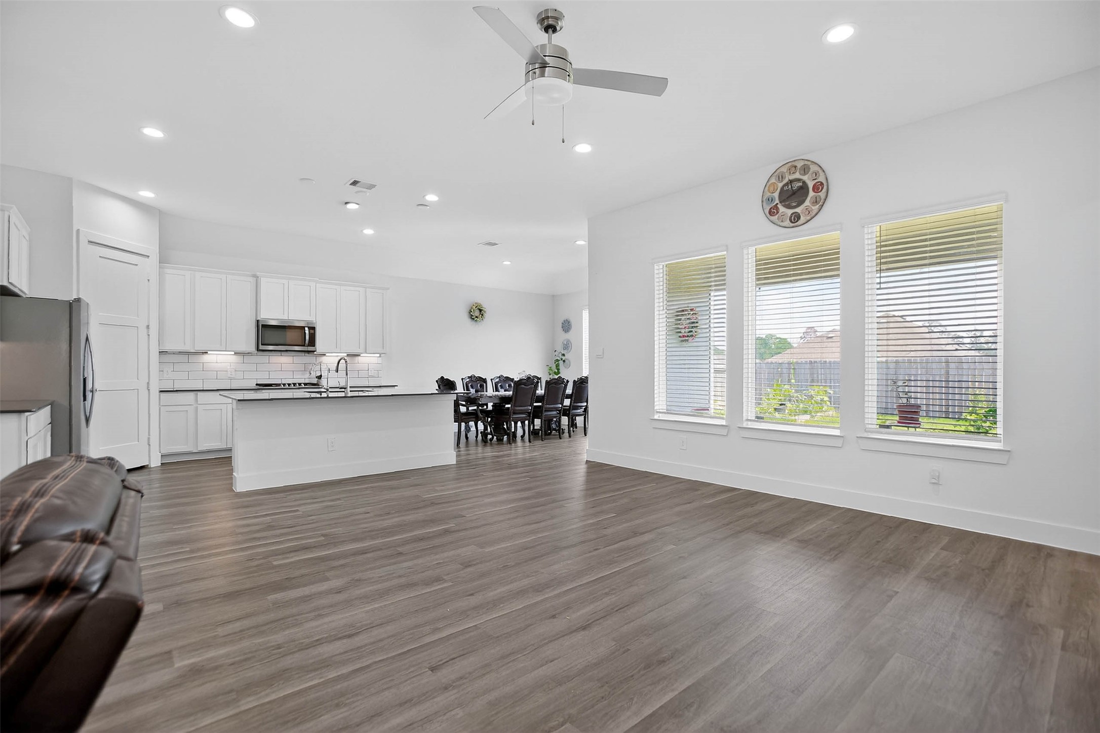 13760 Rising Sun Lane Conroe, TX 77384 - Photo 11 of 43 a view of a kitchen with microwave and cabinets
