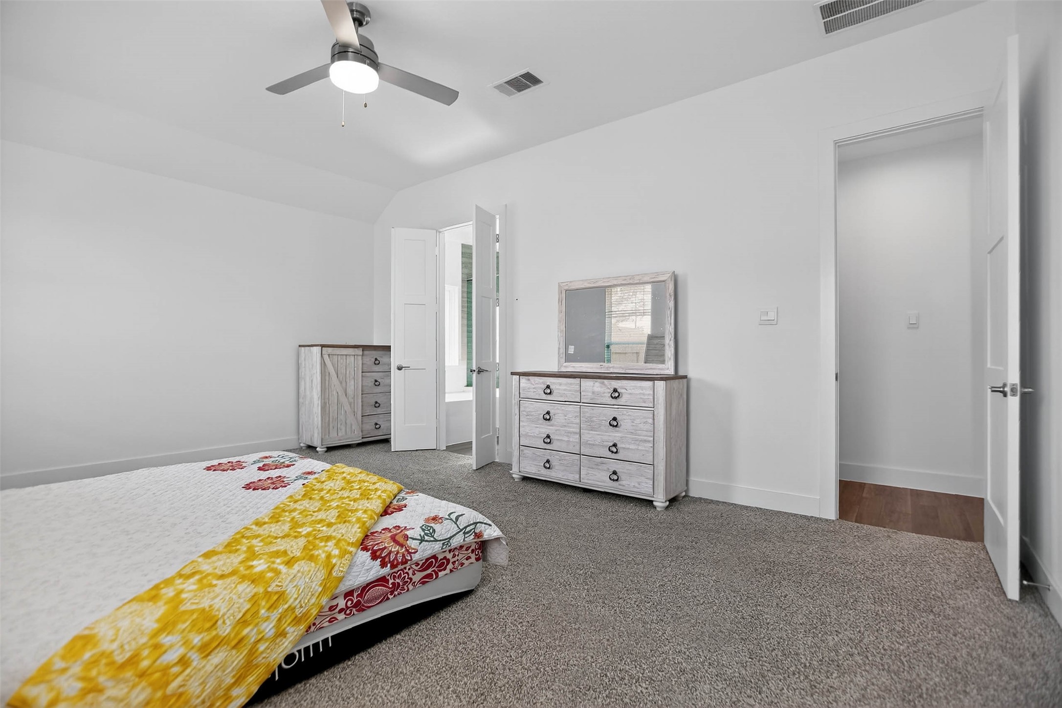 13760 Rising Sun Lane Conroe, TX 77384 - Photo 29 of 43 a bedroom with a bed dresser and window