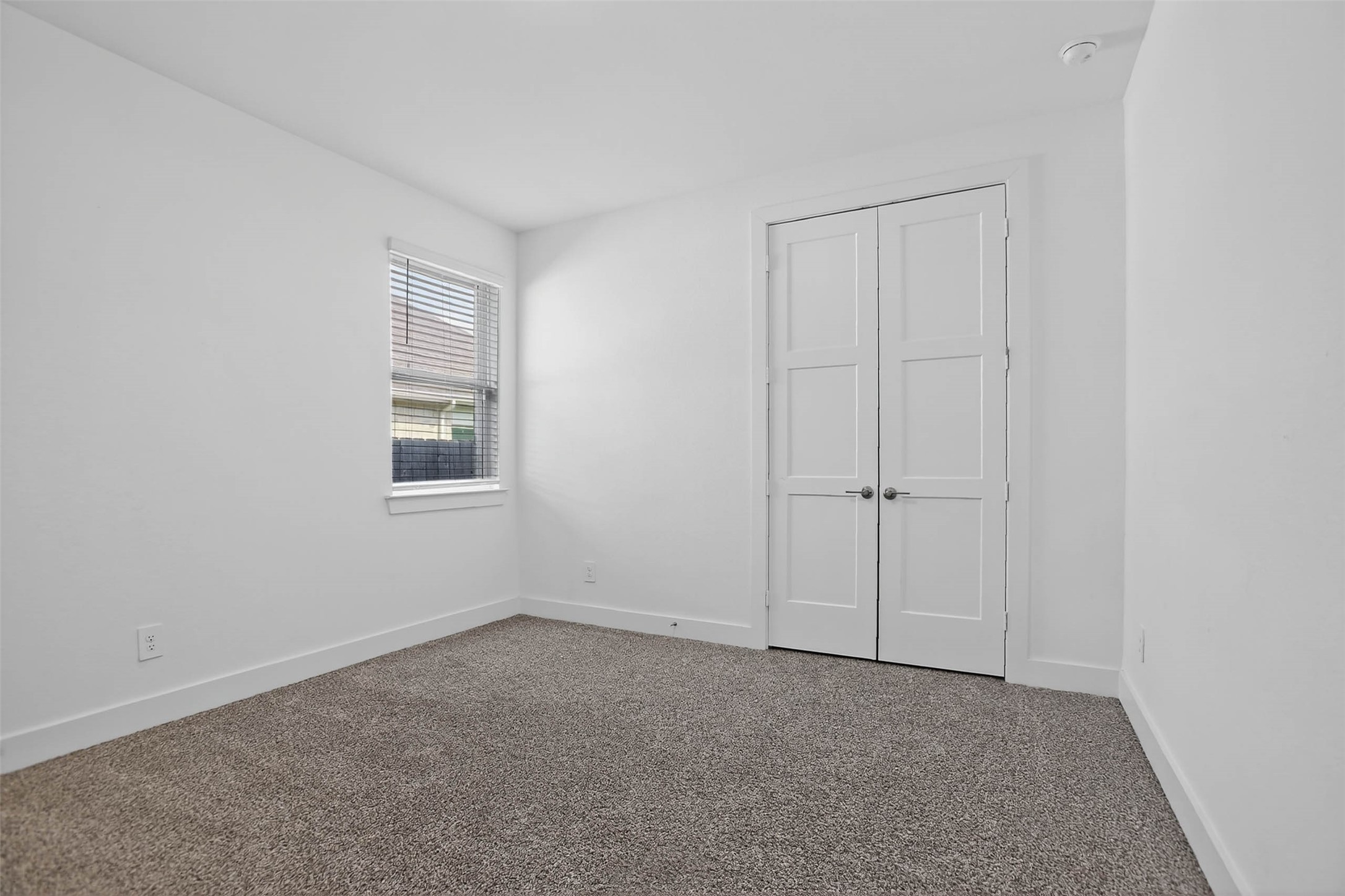 13760 Rising Sun Lane Conroe, TX 77384 - Photo 33 of 43 a view of an empty room with a window
