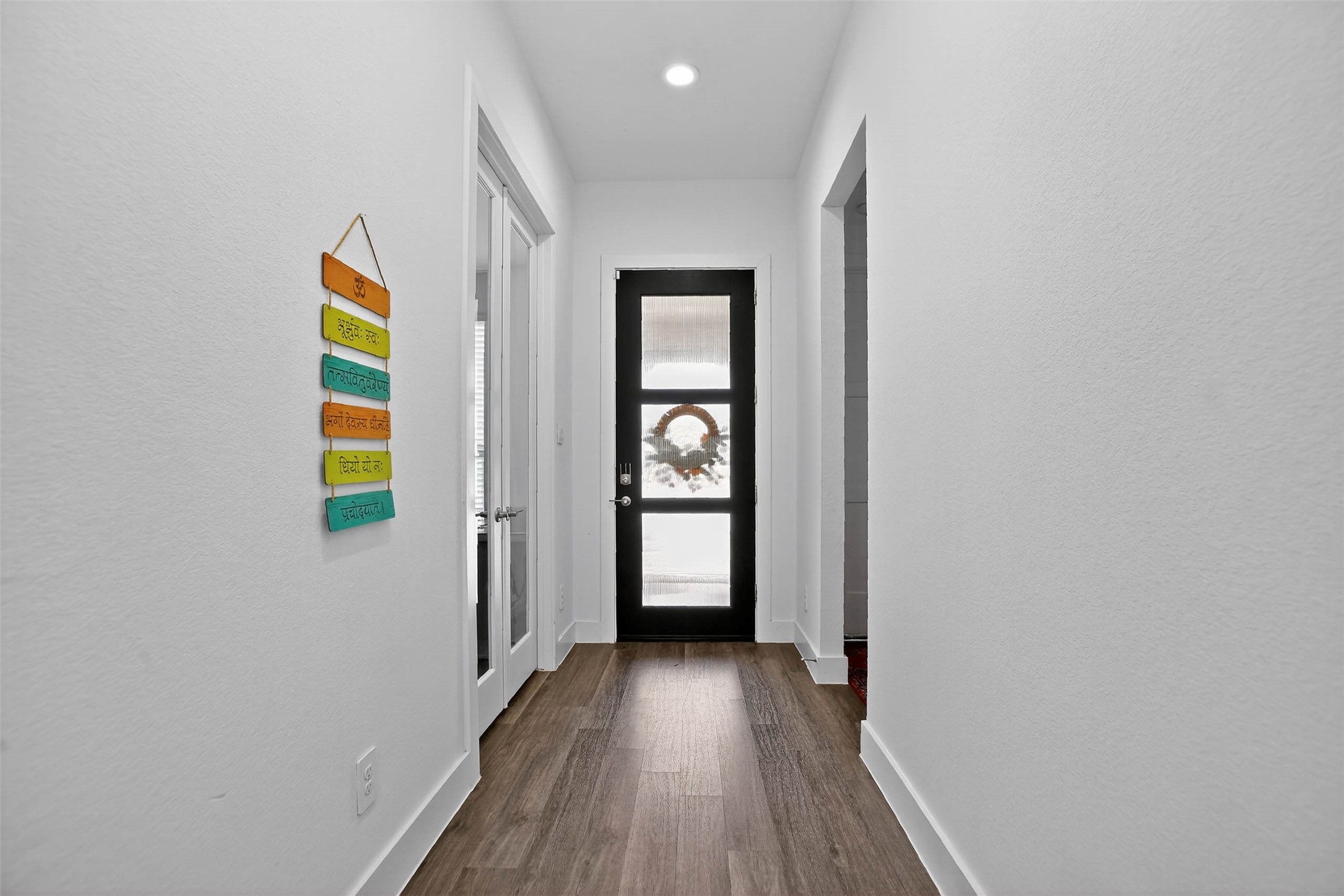 13760 Rising Sun Lane Conroe, TX 77384 - Photo 6 of 43 a view of an entryway door with wooden floor