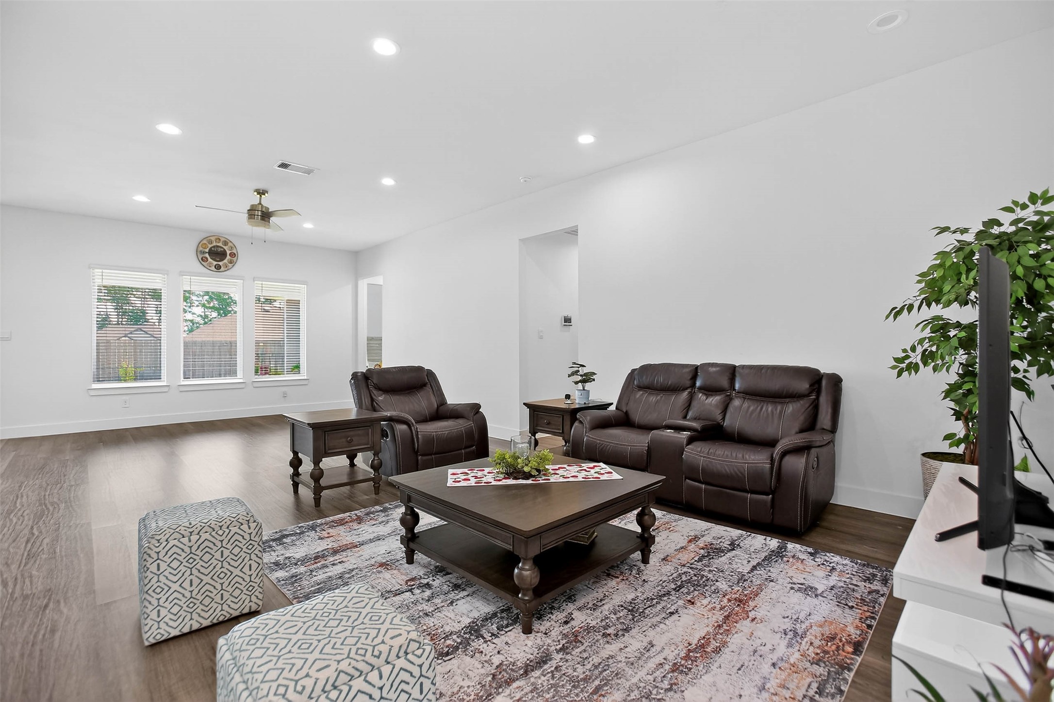 13760 Rising Sun Lane Conroe, TX 77384 - Photo 7 of 43 a living room with furniture and a large window