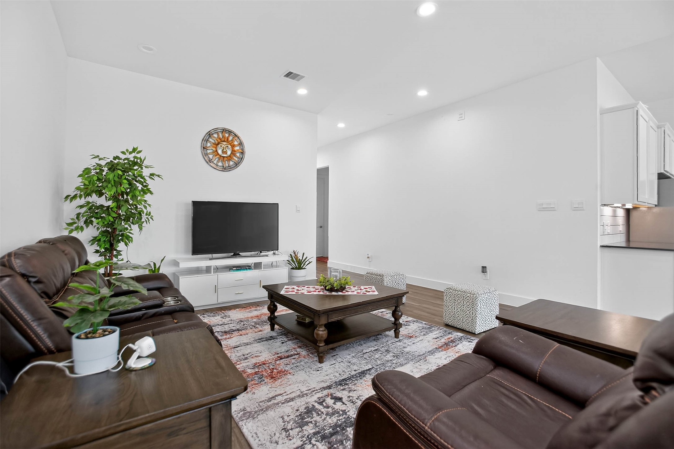 13760 Rising Sun Lane Conroe, TX 77384 - Photo 9 of 43 a living room with furniture and a flat screen tv
