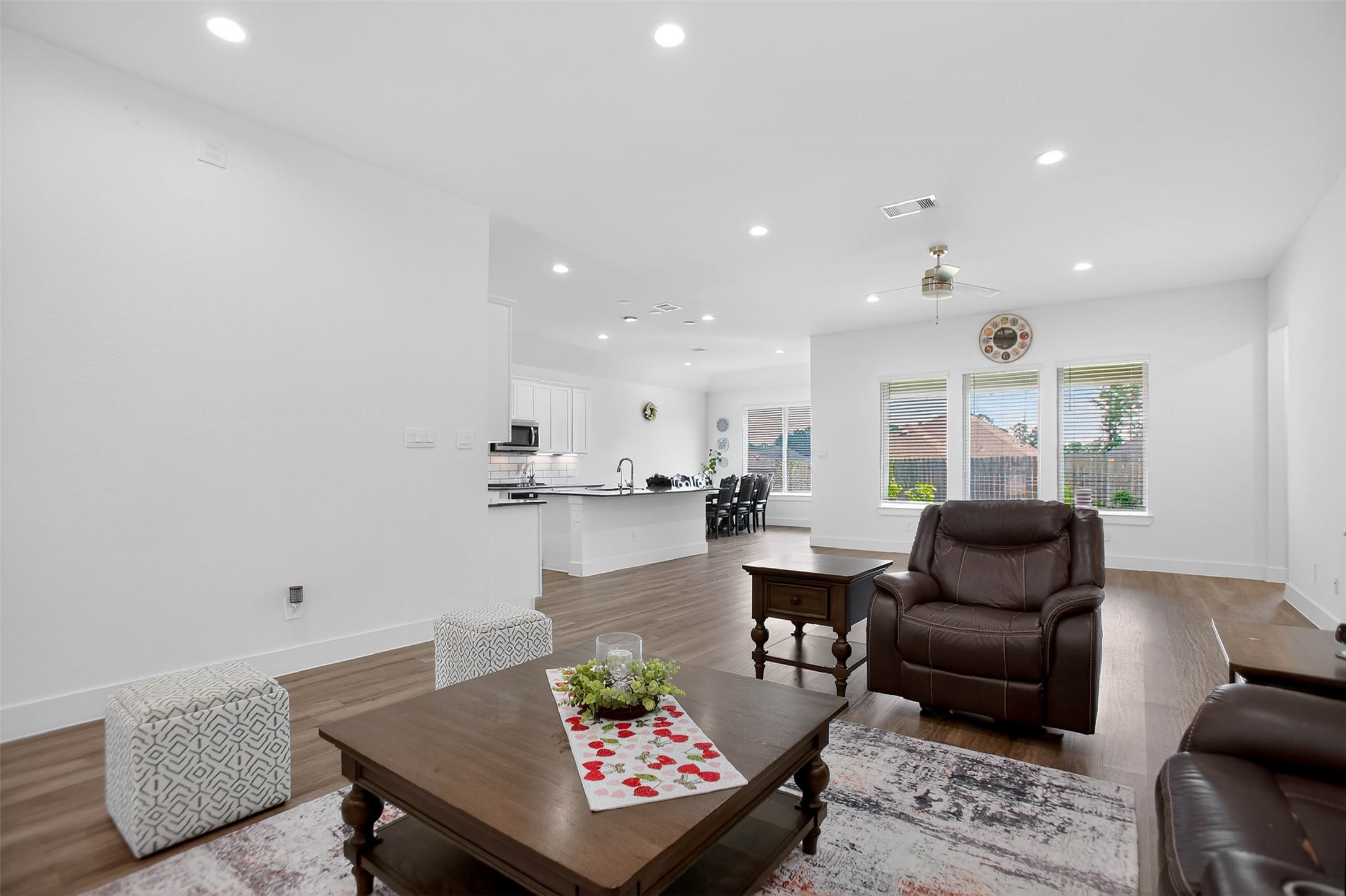 13760 Rising Sun Lane Conroe, TX 77384 - Photo 10 of 43 a living room with furniture and view of kitchen