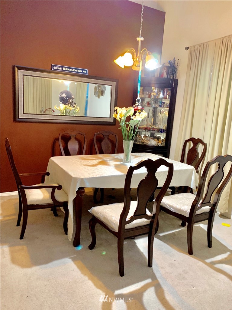2969 South 296th Street Federal Way, WA 98003 - Photo 2 of 5 a dining room with furniture and window