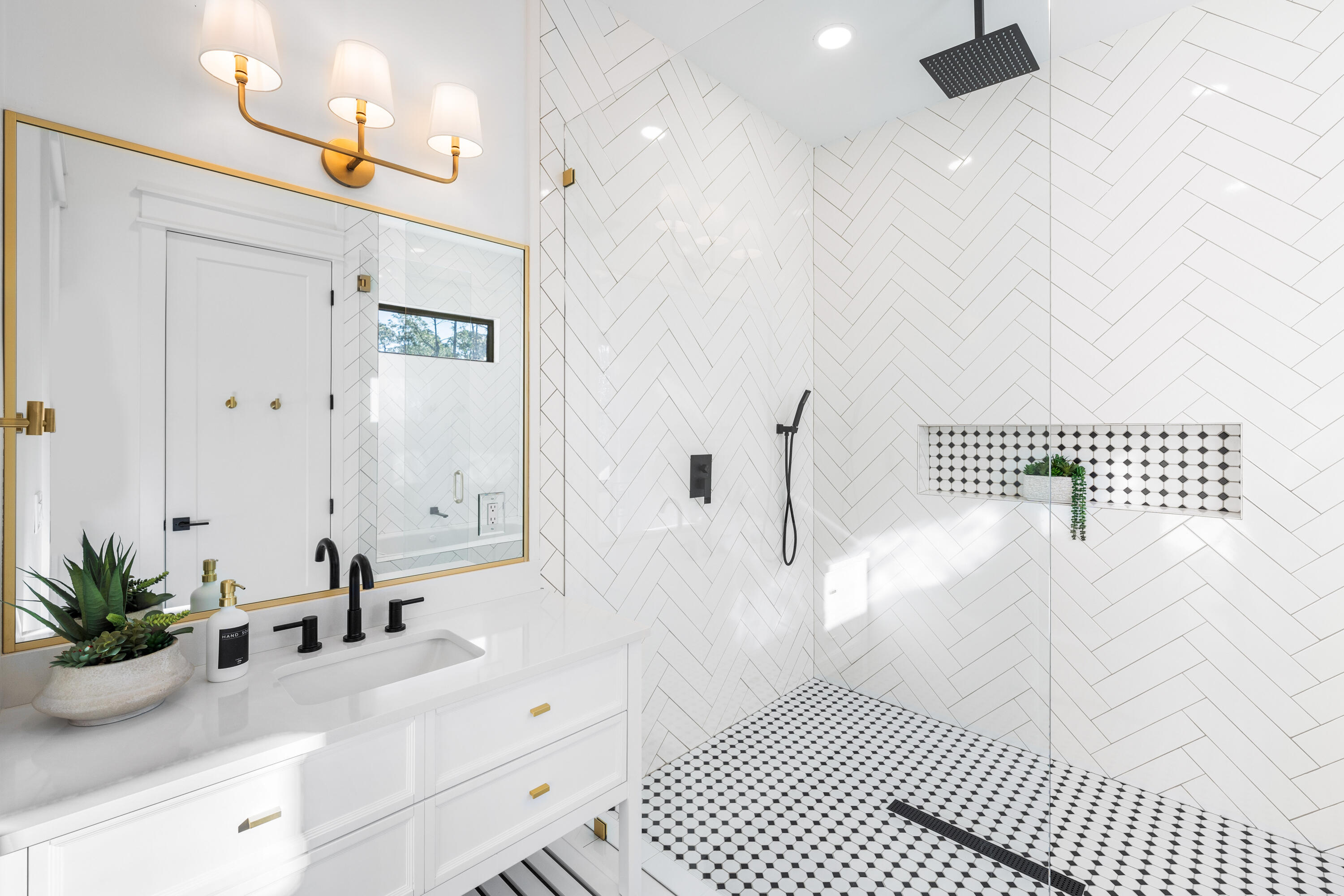 783 Indian Woman Road Santa Rosa Beach, FL 32459 - Photo 19 of 33 a bathroom with a sink a mirror and a shower