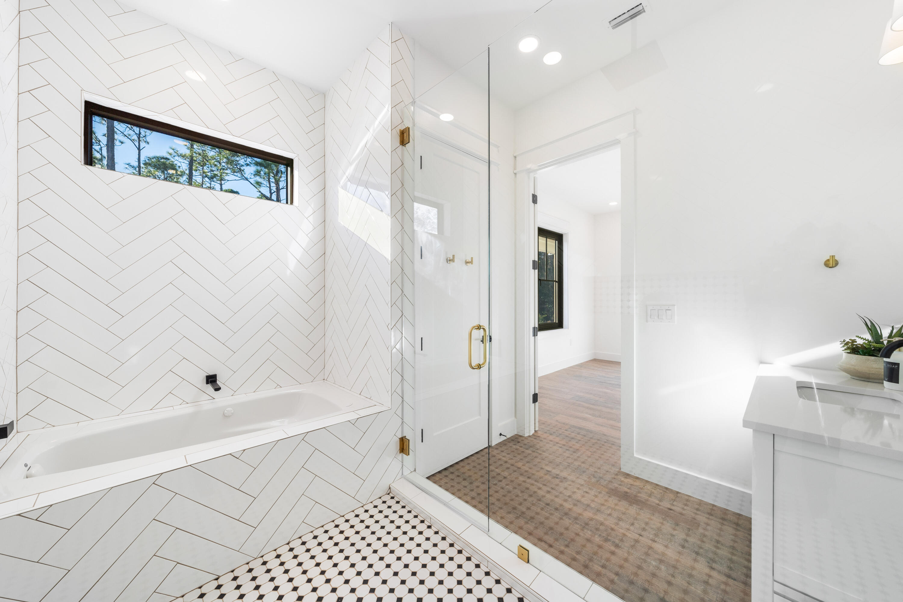 783 Indian Woman Road Santa Rosa Beach, FL 32459 - Photo 20 of 33 a bathroom with a bathtub and a shower