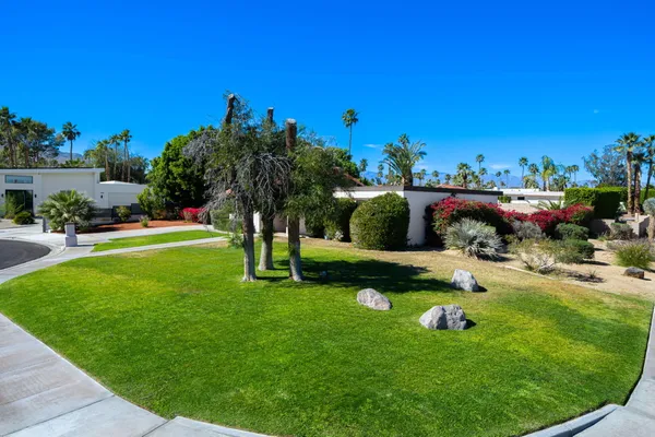 a view of a golf course with a garden