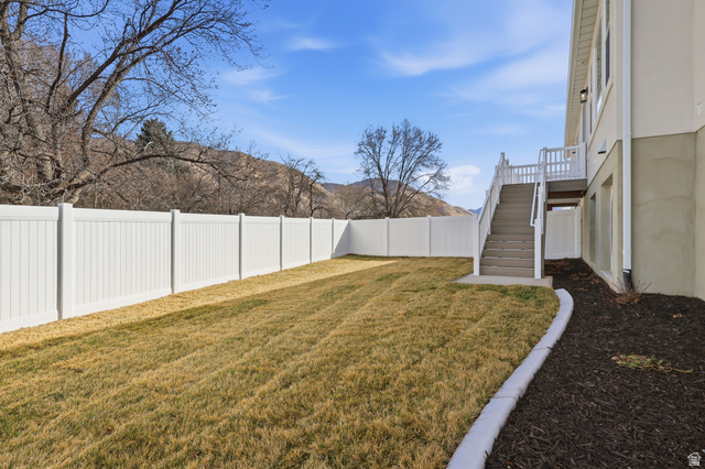 677 East 800 S Street Springville, UT 84663 - Photo 33 of 35 Fenced backyard featuring stairway and a deck with mountain view