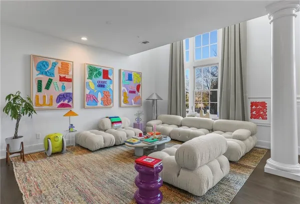 a bedroom with furniture and a window