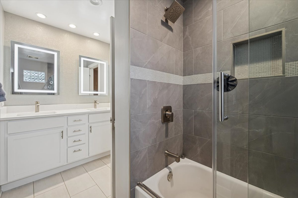 1908 McCraren Road Highland Park, IL 60035 - Photo 20 of 37 a bathroom with a sink a toilet and shower