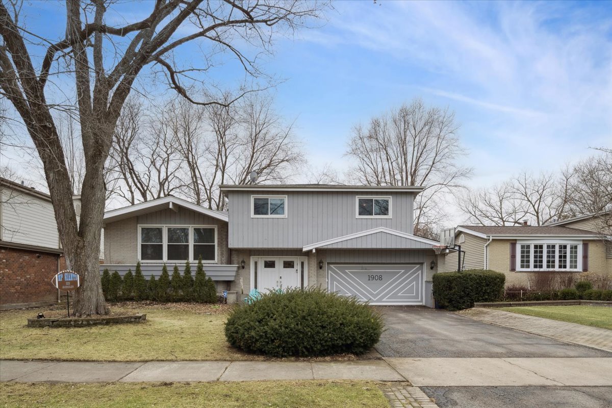 1908 McCraren Road Highland Park, IL 60035 - Photo 2 of 37 a front view of a house with a yard