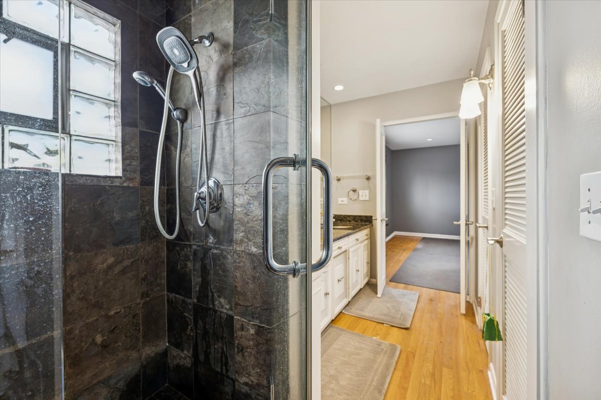 1908 McCraren Road Highland Park, IL 60035 - Photo 24 of 37 a bathroom with a tub and shower