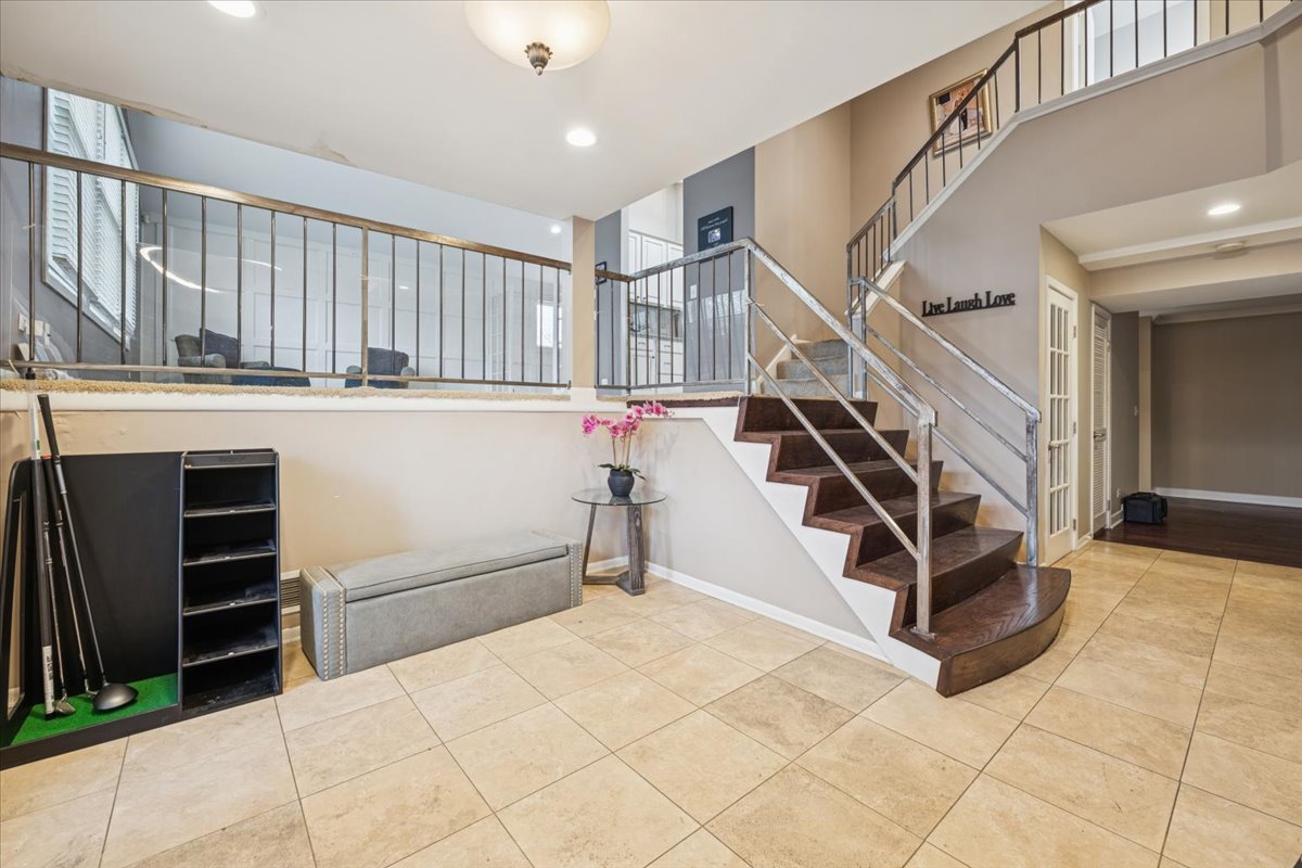 1908 McCraren Road Highland Park, IL 60035 - Photo 5 of 37 a view of a livingroom with furniture and staircase
