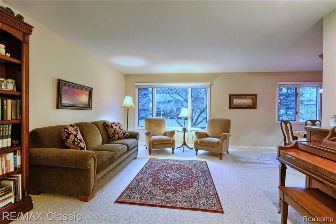 35610 Tall Pine Road Farmington, MI 48335 - Photo 4 of 32 Living Room with Large Window View of Back Yard