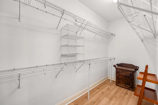 a view of a room with racks on the wall