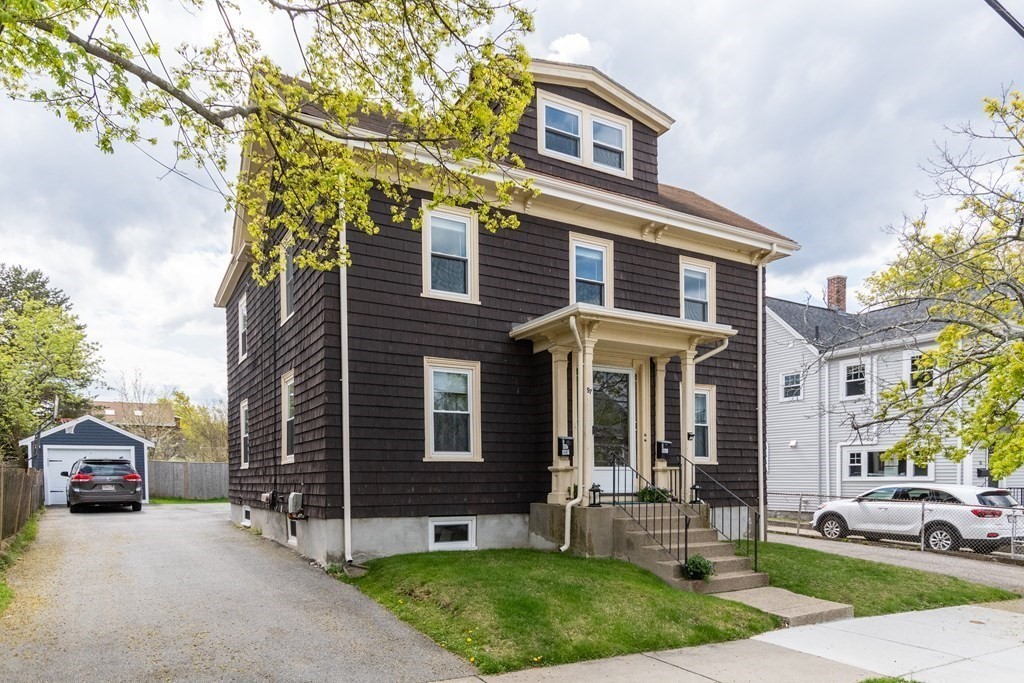 57 Cook Street Newton, MA 02458 - Photo 27 of 28 a front view of a house with garden
