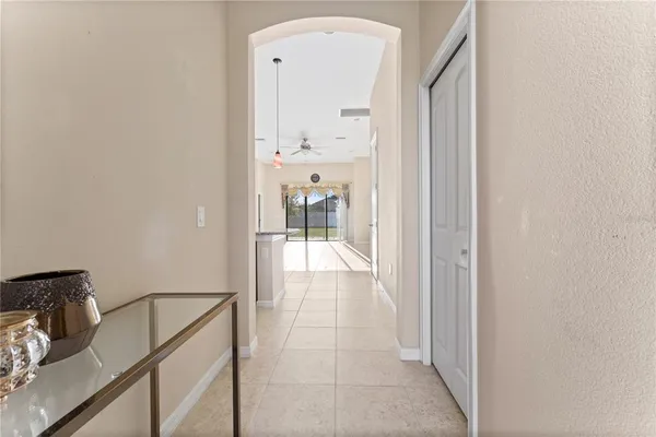 a view of a hallway and interior of the house