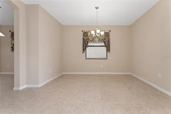 a view of an empty room with window