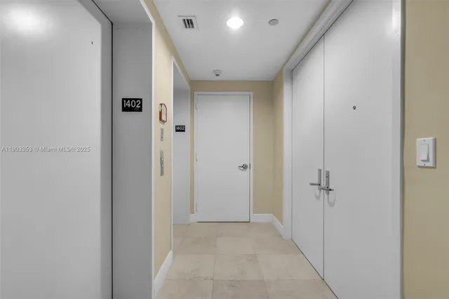 a view of a city with tall buildings in front of it