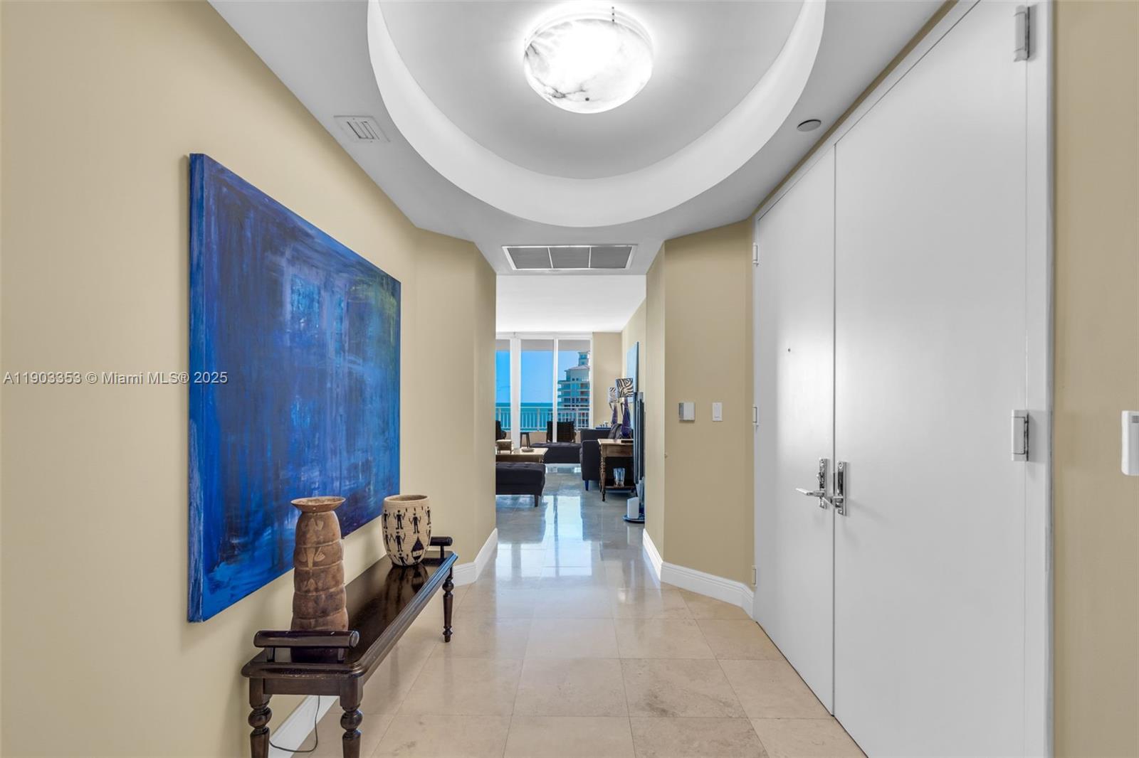 791 Crandon Boulevard, Unit 1402 Key Biscayne, FL 33149 - Photo 44 of 56 a view of a hallway with livingroom and furniture