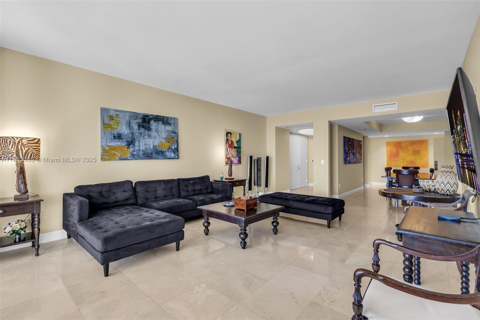 791 Crandon Boulevard, Unit 1402 Key Biscayne, FL 33149 - Photo 7 of 56 a living room with furniture
