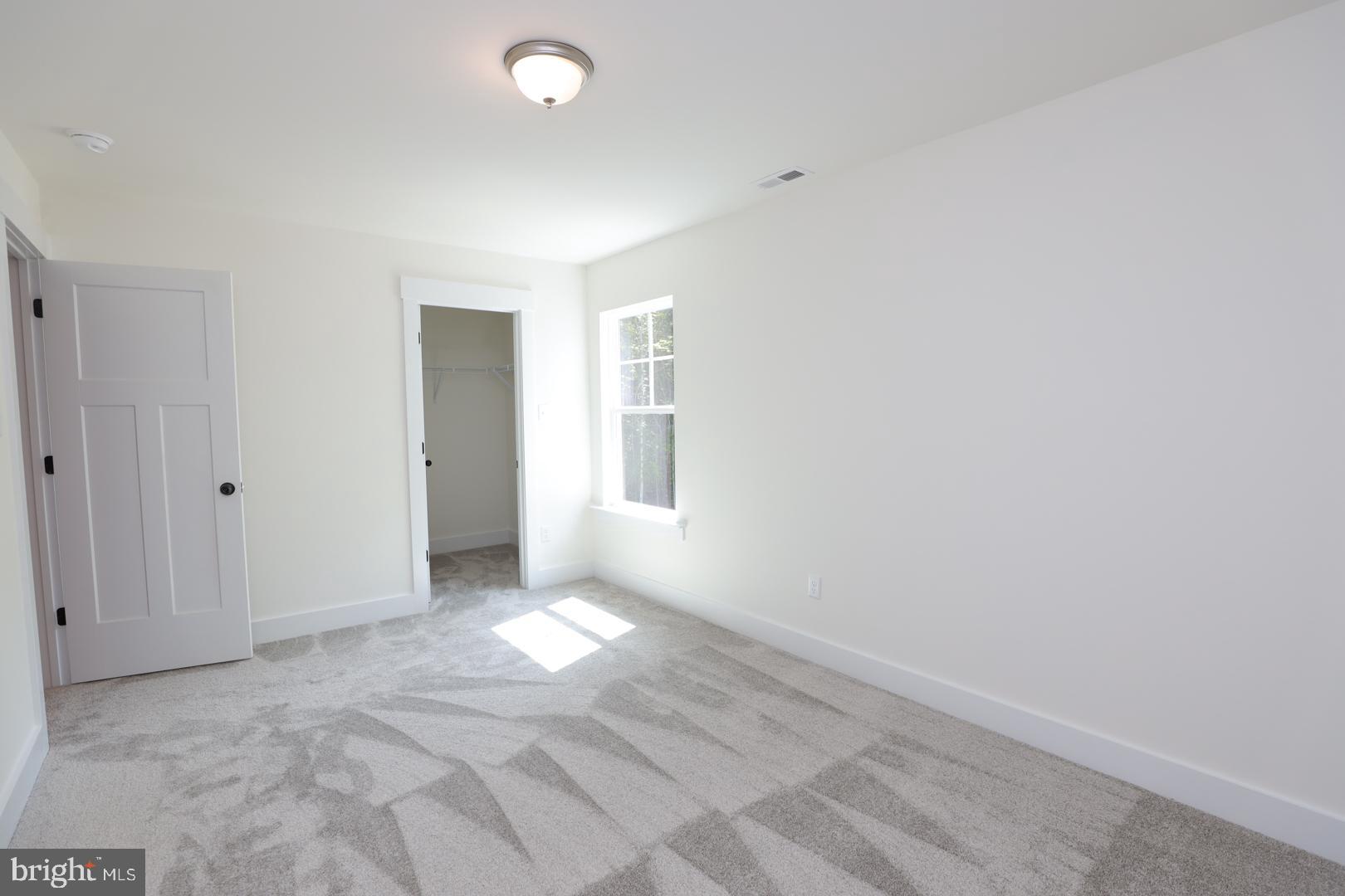 16877 Watchman Way Beaverdam, VA 23015 - Photo 6 of 10 a view of an empty room