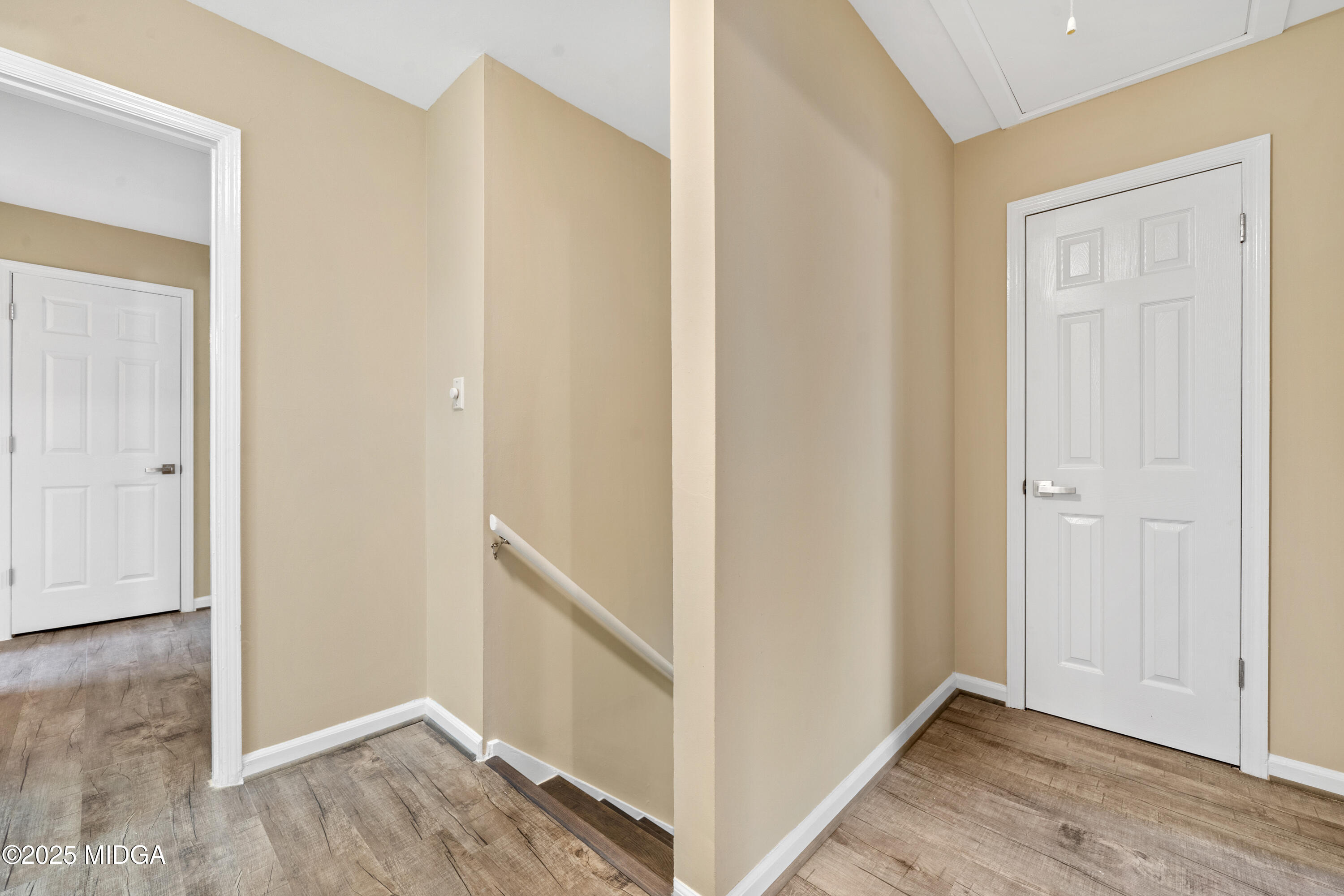 1303 Forest Hill Road Macon, GA 31210 - Photo 28 of 54 a view of a hallway with wooden floor