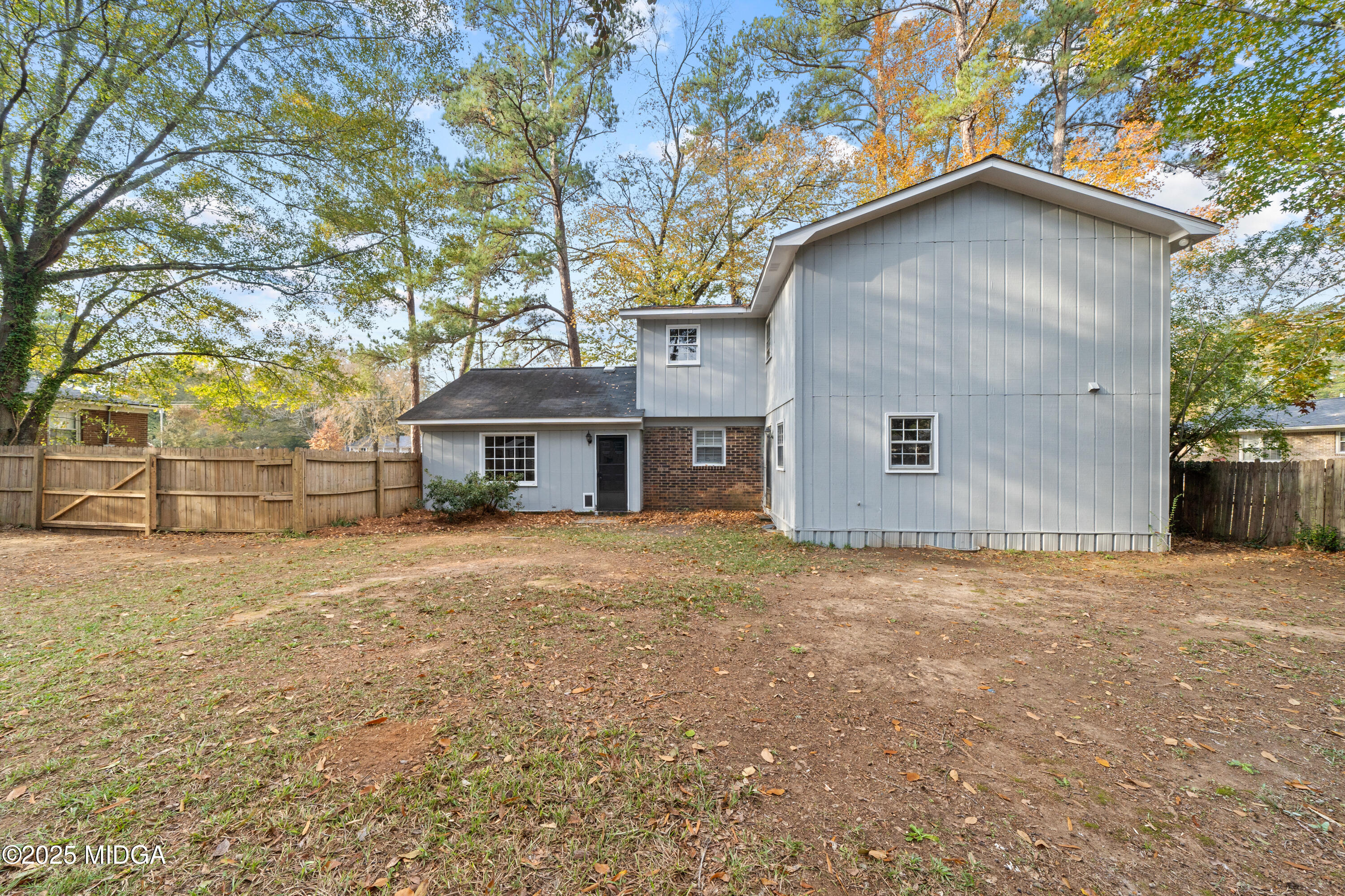 1303 Forest Hill Road Macon, GA 31210 - Photo 42 of 54 a house with trees in the background