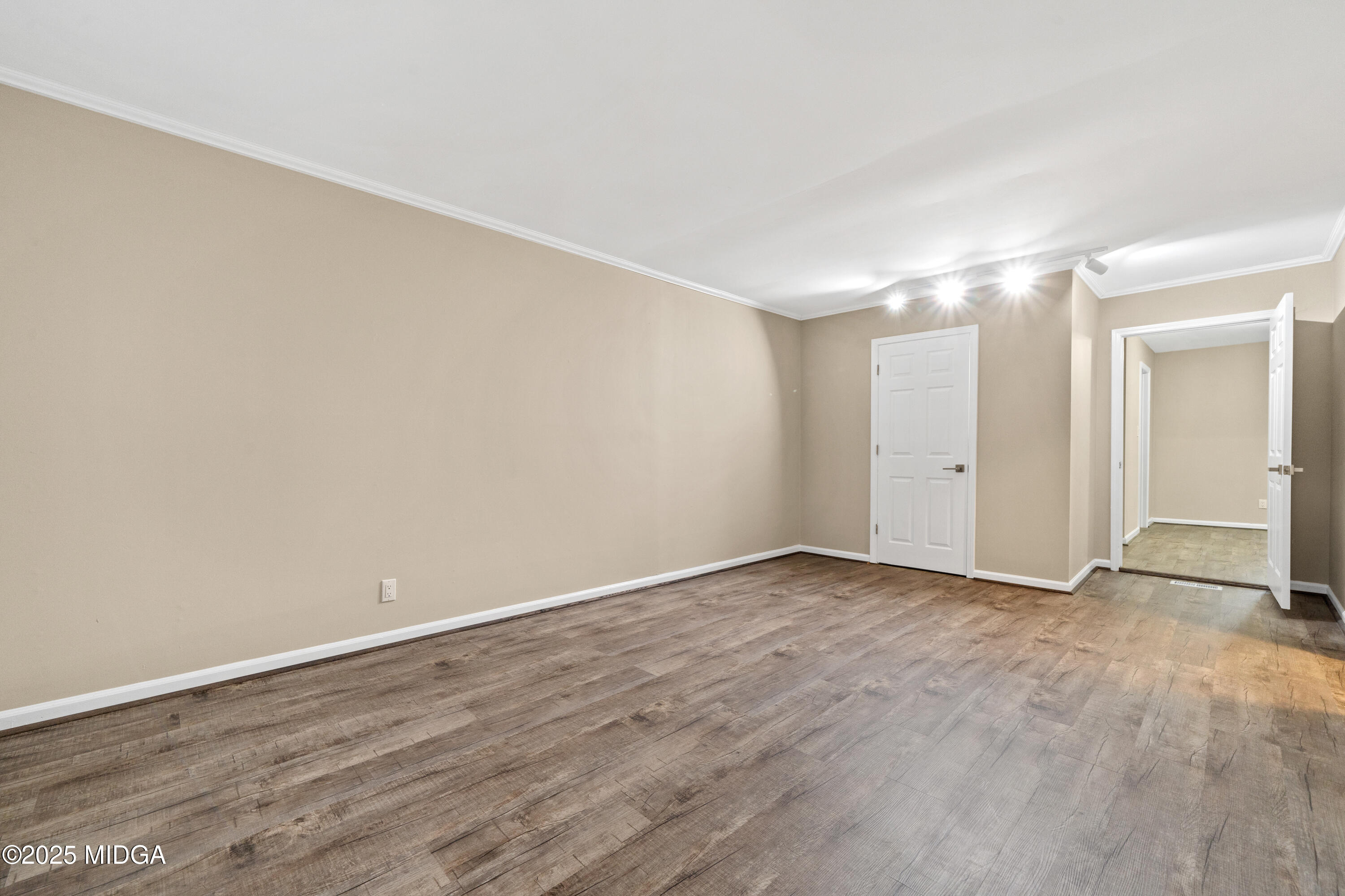 1303 Forest Hill Road Macon, GA 31210 - Photo 5 of 54 a view of an empty room