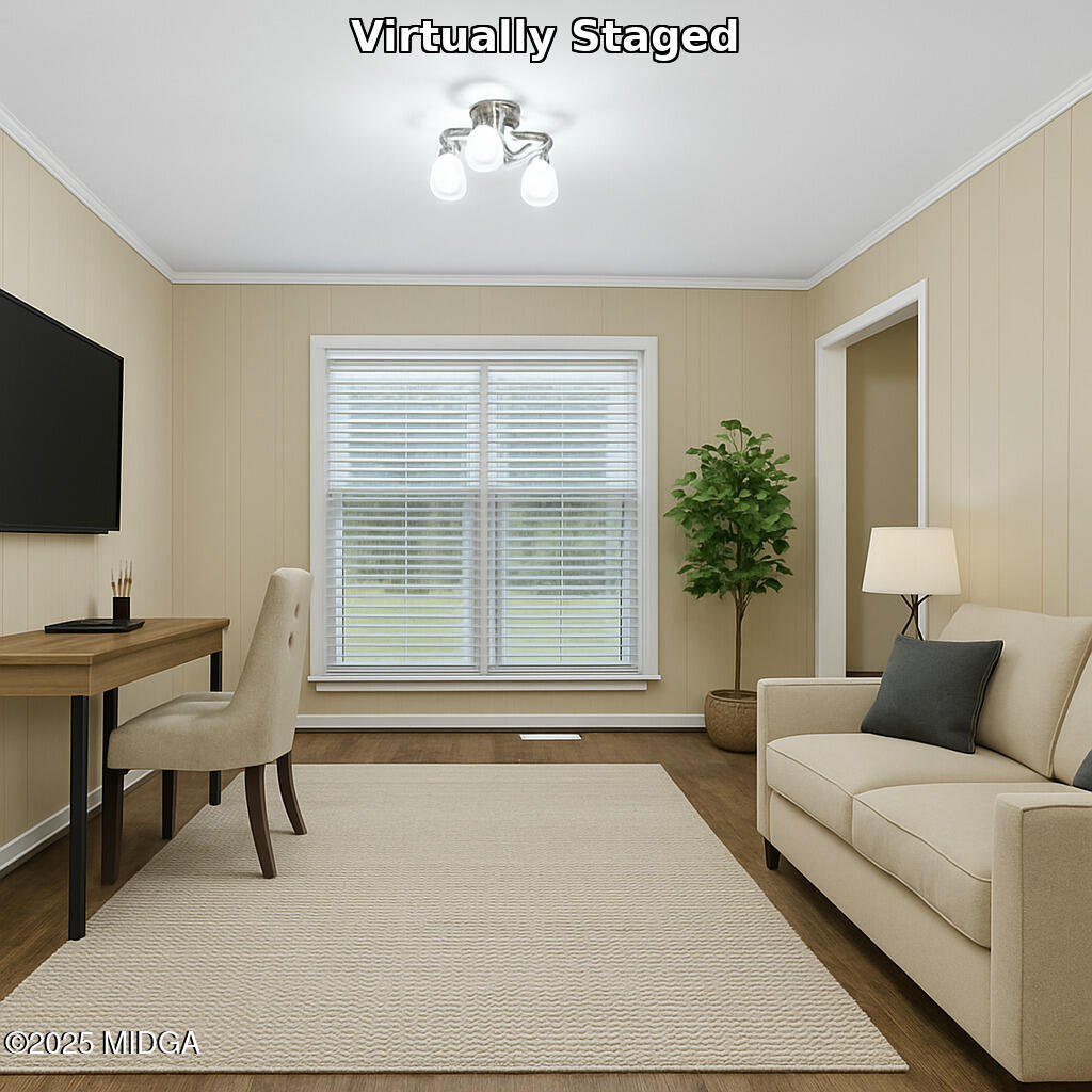 1303 Forest Hill Road Macon, GA 31210 - Photo 51 of 54 a living room with furniture and a flat screen tv