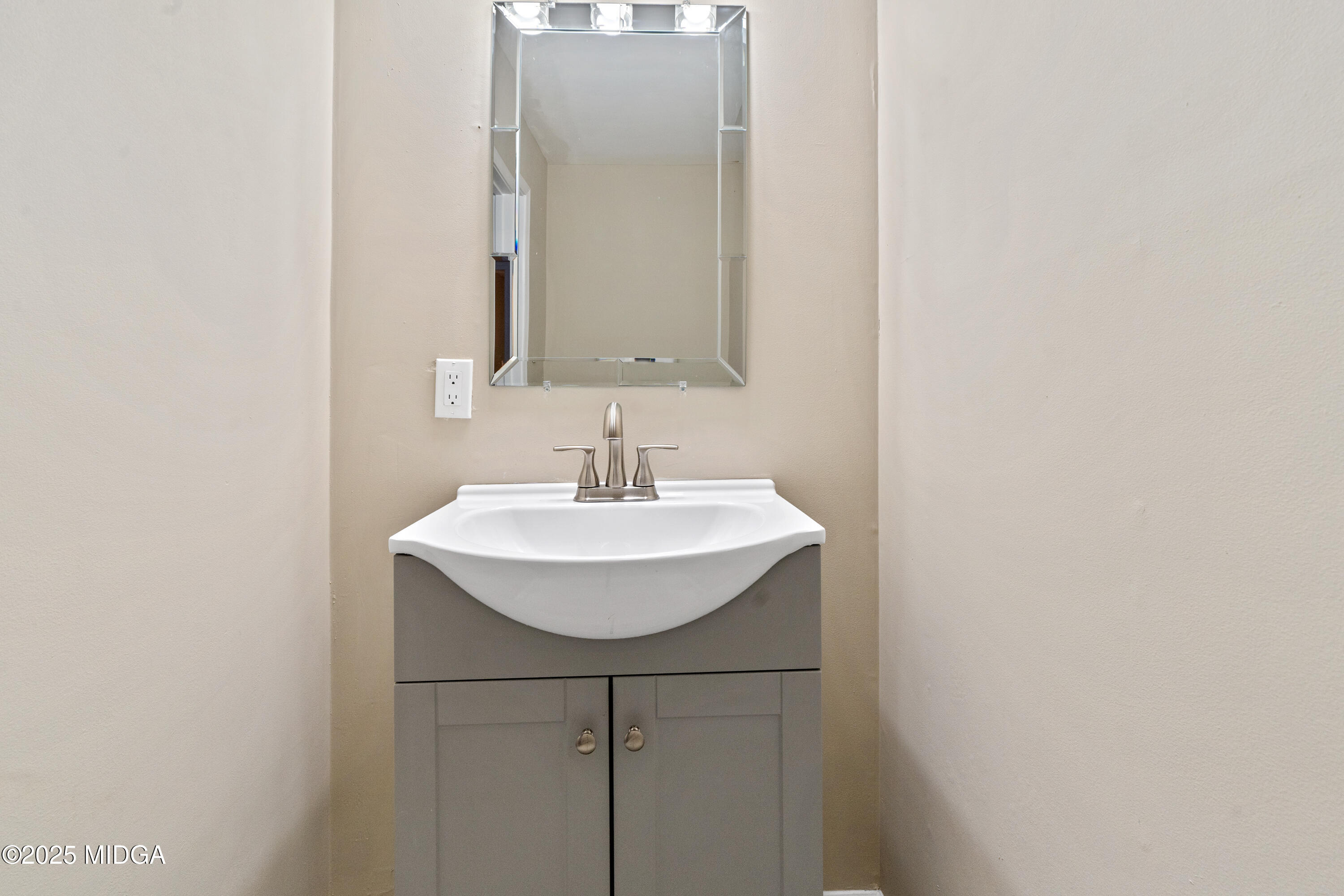 1303 Forest Hill Road Macon, GA 31210 - Photo 8 of 54 a bathroom with a sink and a mirror
