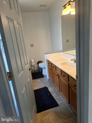a hallway with cabinets