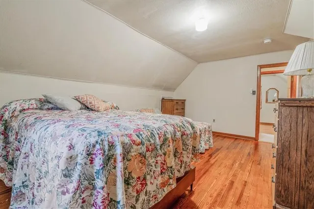 a bathroom with a sink toilet and mirror