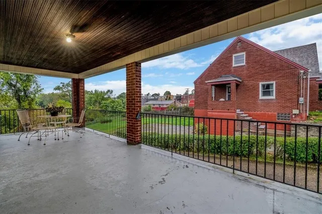 a view of a porch with furniture