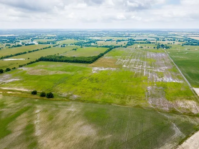 a view of a lake with a city