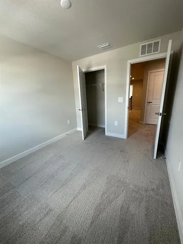 an empty room with closet