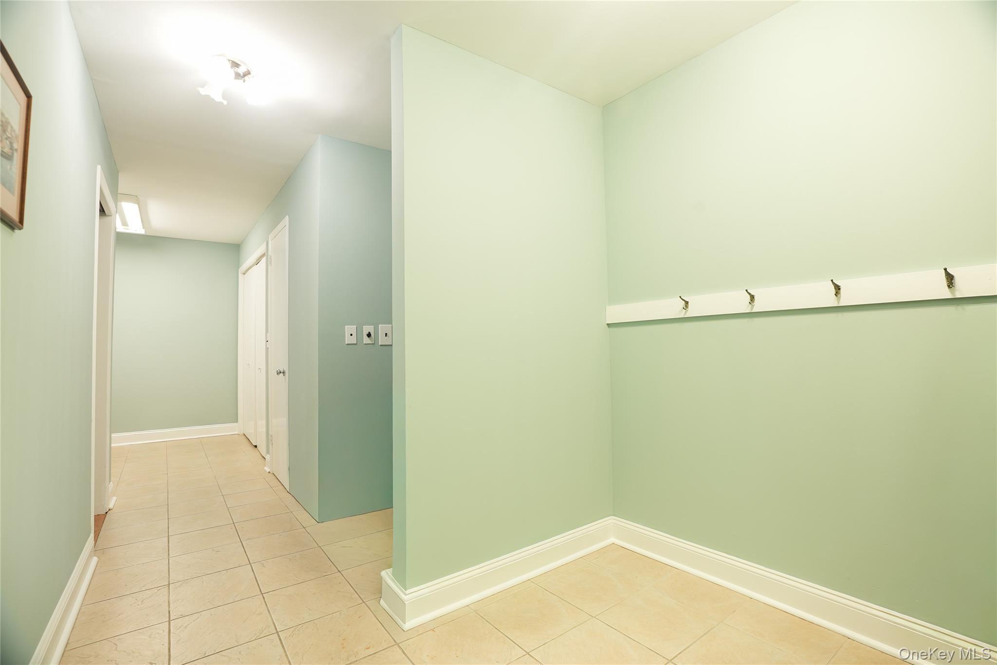 22 Peters Lane Pound Ridge, NY 10576 - Photo 33 of 43 Mudroom/side door entrance.